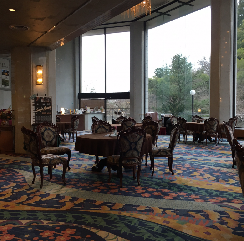 a room with a table and chairs