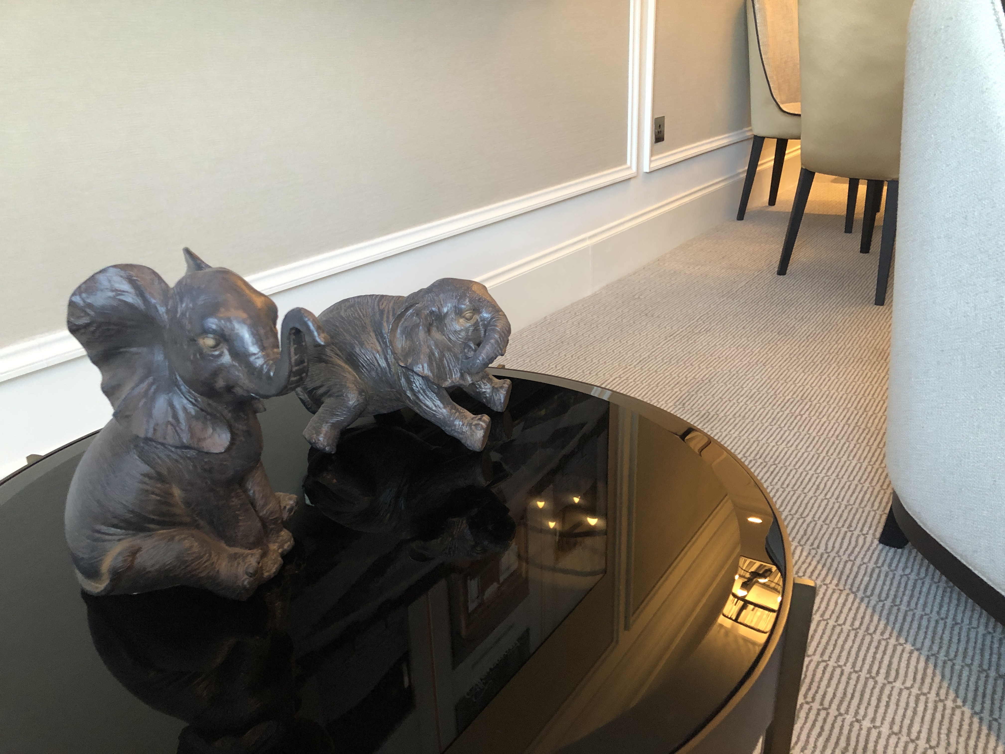 a statue of elephants on a table