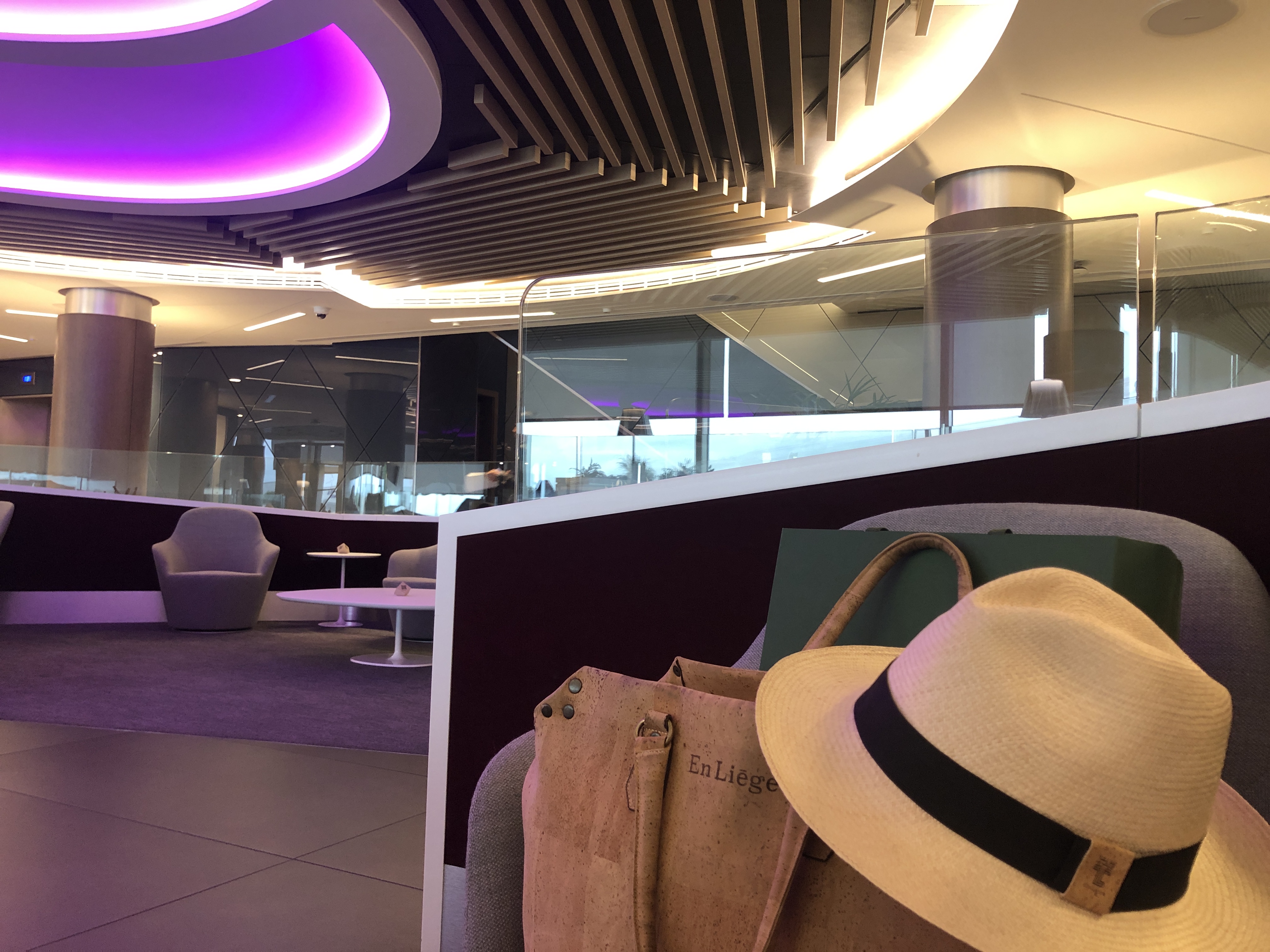 a hat and purse in a room