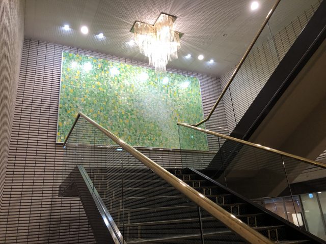a staircase with a large window