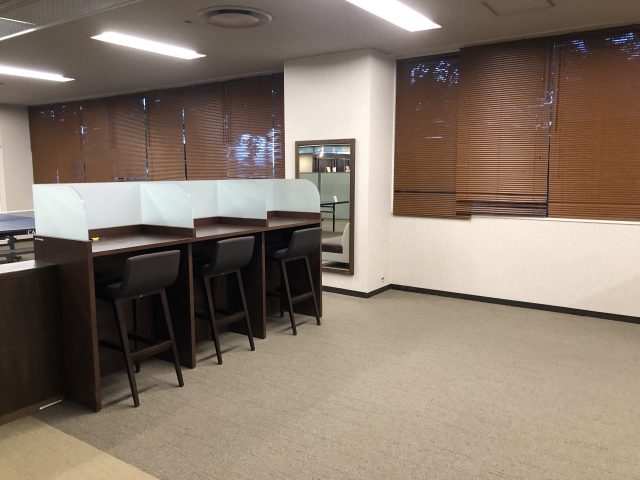 a room with a table and chairs