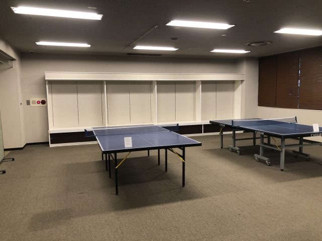 a room with a table and chairs