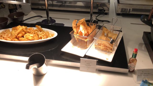 a couple of plates of food on a counter