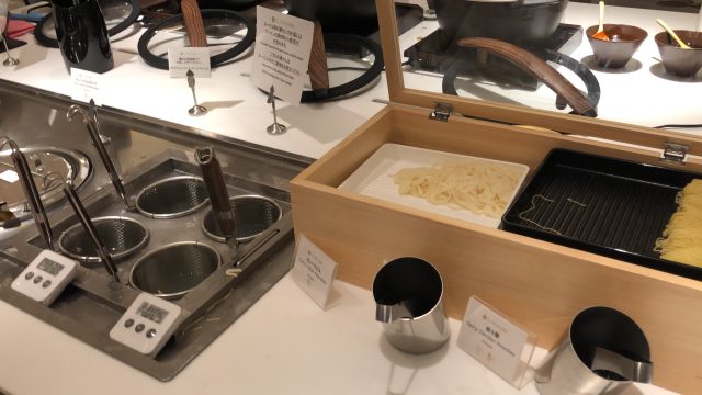 a kitchen counter with various cooking items