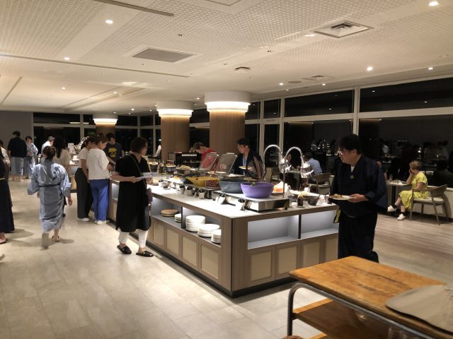 people standing around a table