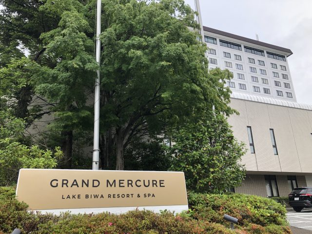 a sign in front of a building