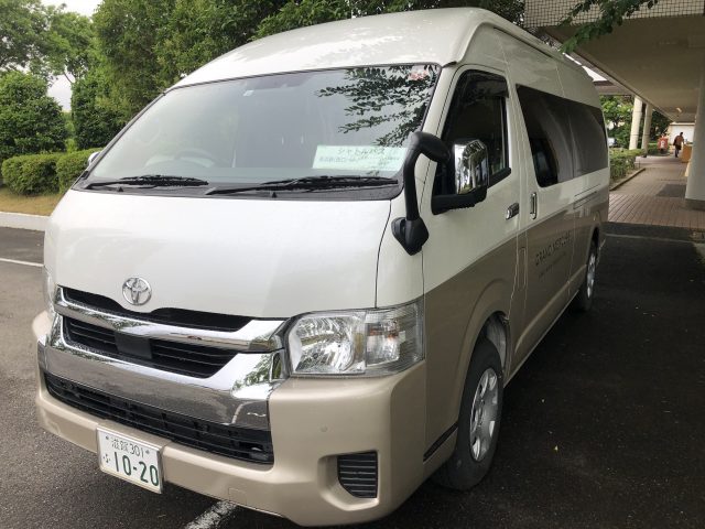 a white van parked on the side of a road