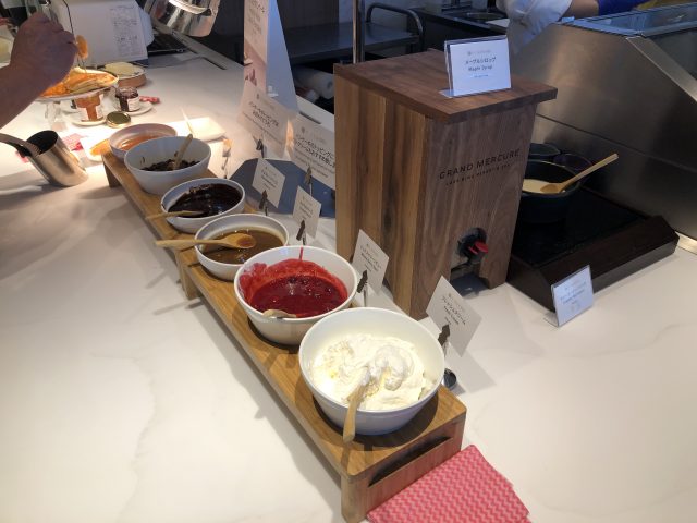 a table with bowls of food