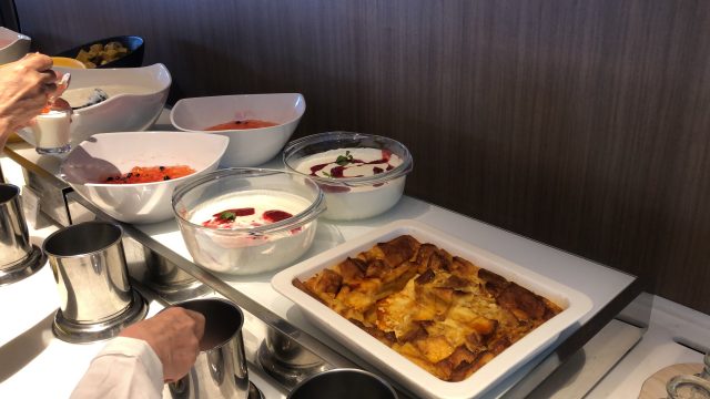 a person cooking food on a stove