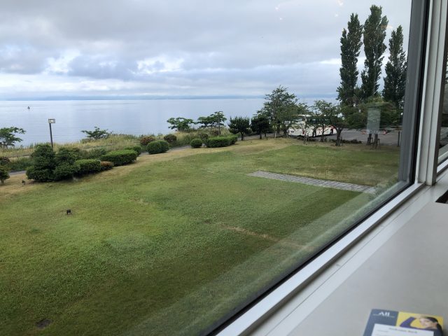 a view of a golf course from a window
