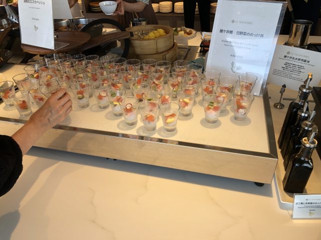 a table with glasses of liquid