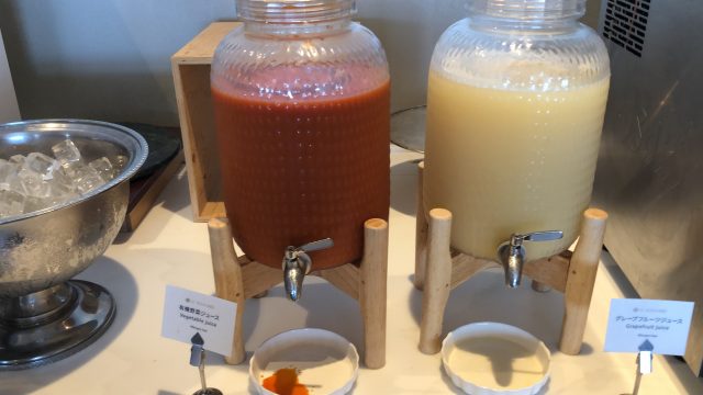 a couple of glass jars with liquid in them